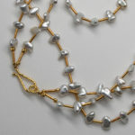 closeup of Japanese Keshi pearls with 18K gold hook & eye clasp