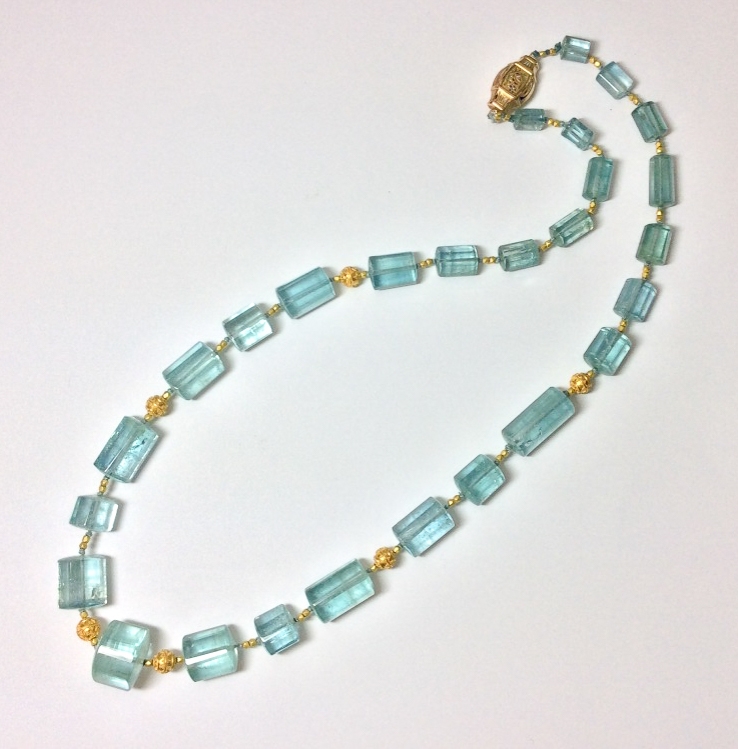 Aquamarine Crystal necklace with antique enamel 18K gold clasp and 20 K gold Bali granulated beads full photograph.