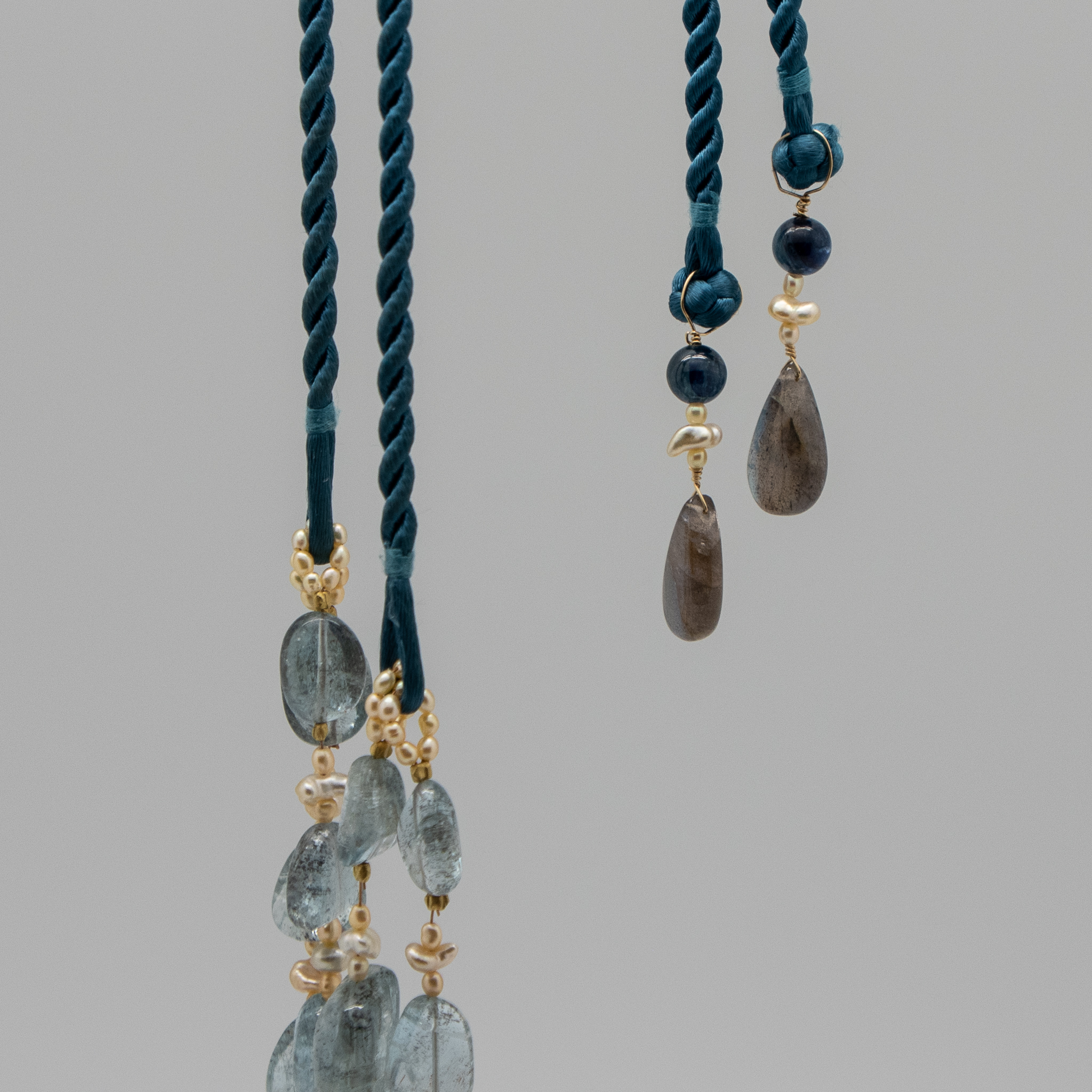dressmaker details on aquamarine necklace