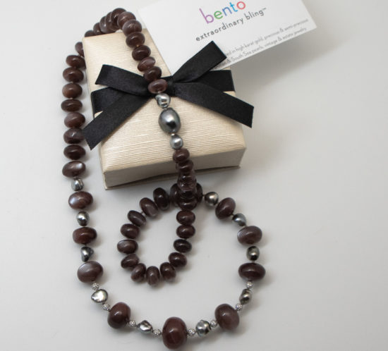 Chocolate Moonstone Necklace with Pearls, photograph showing 13mm Tahitian pearl clasp and bento presentation box