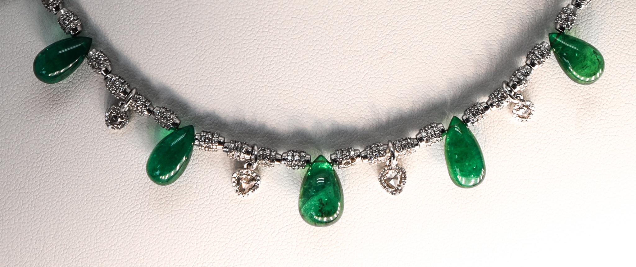 close-up shot of smooth emerald briolettes