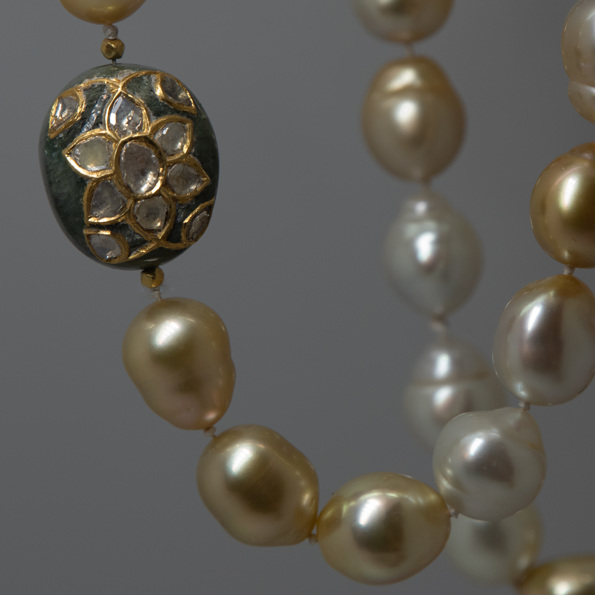 Philippine Golden South Sea Pearls with emerald clasp