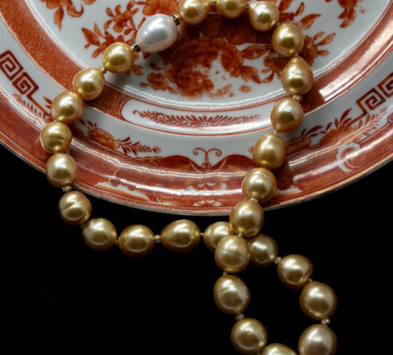 Golden South Sea Pearl on an antique Chinese plate