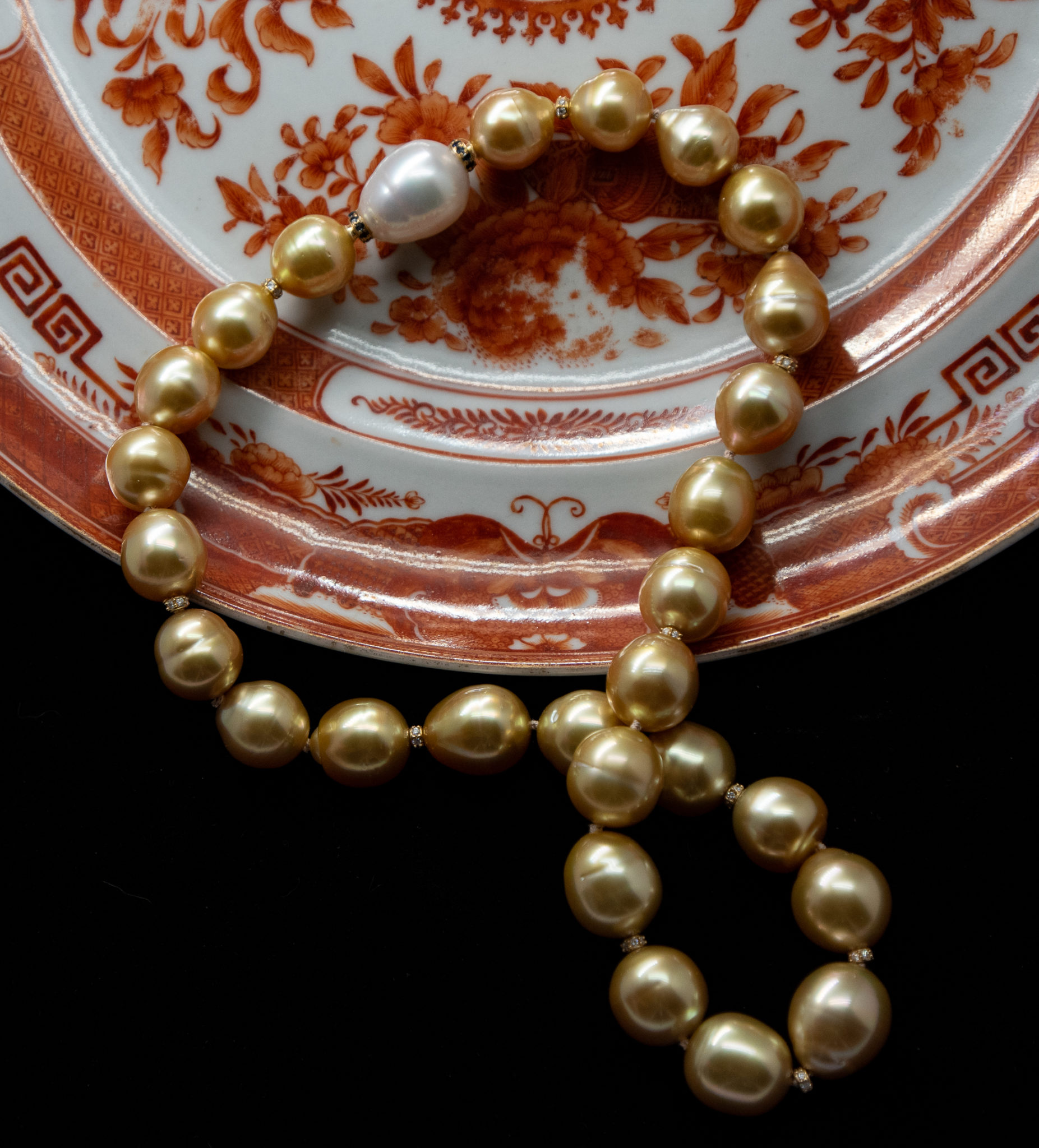 Golden South Sea Pearl on an antique Chinese plate