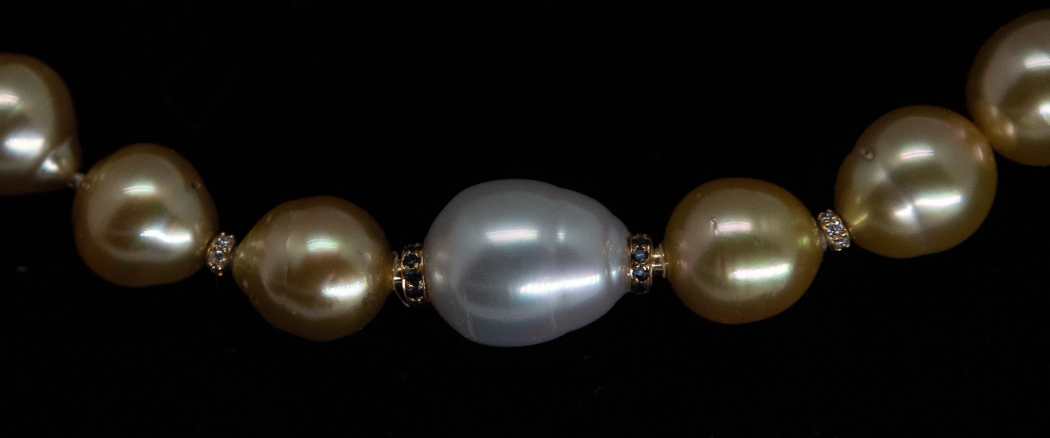 Closeup of South Sea Pearl interchangeable clasp with sapphires