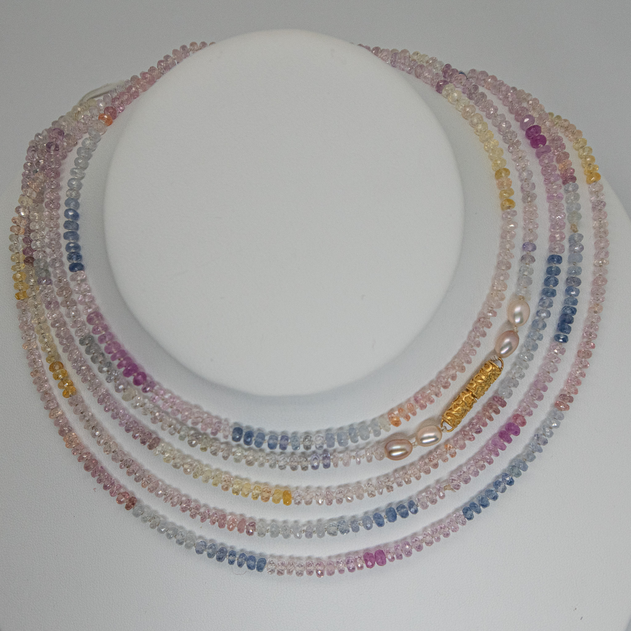 delicate multi-color sapphire necklace shown wrapped 4 times for a choker-length look