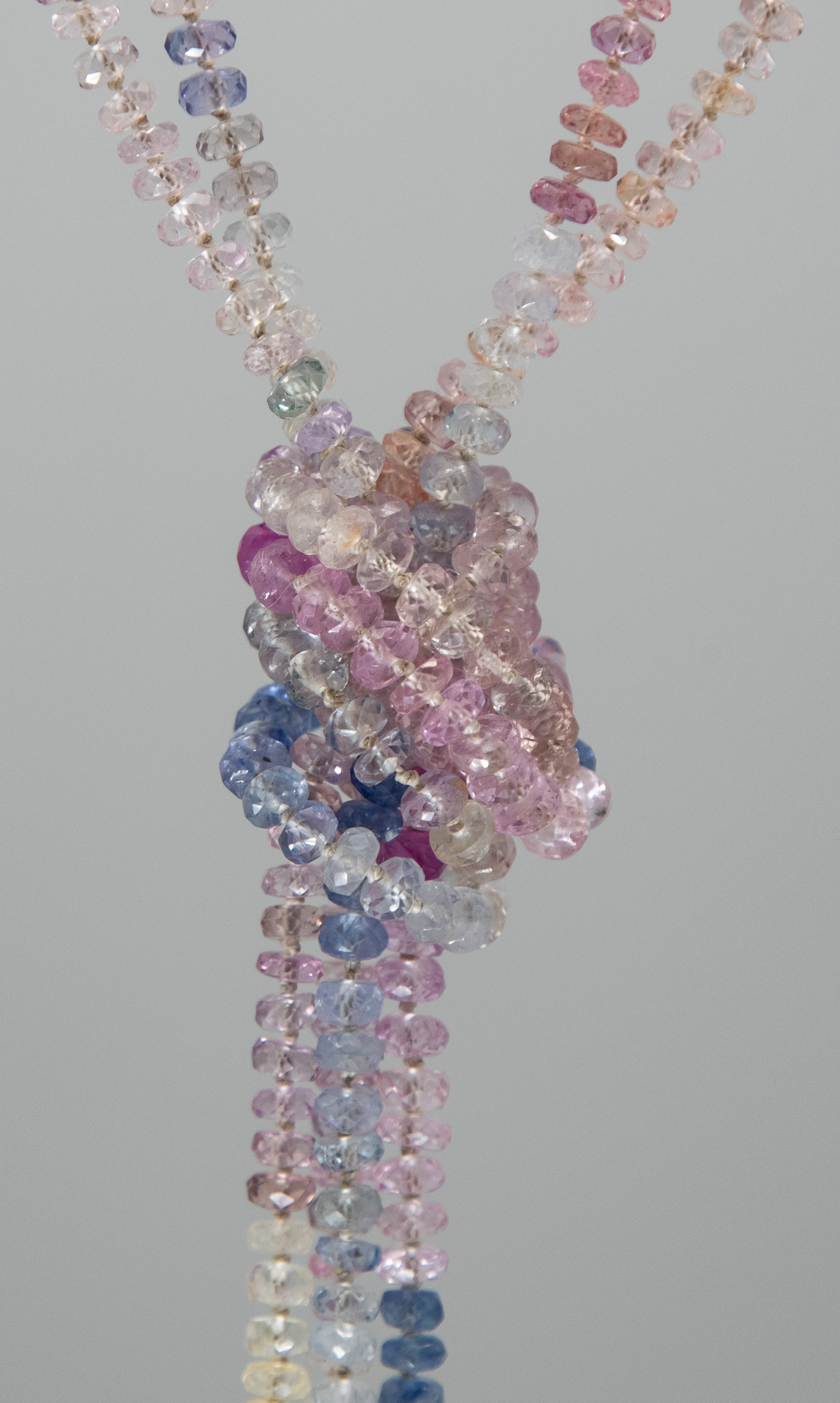 multi-color delicate faceted sapphire necklace: detail of individual knotting