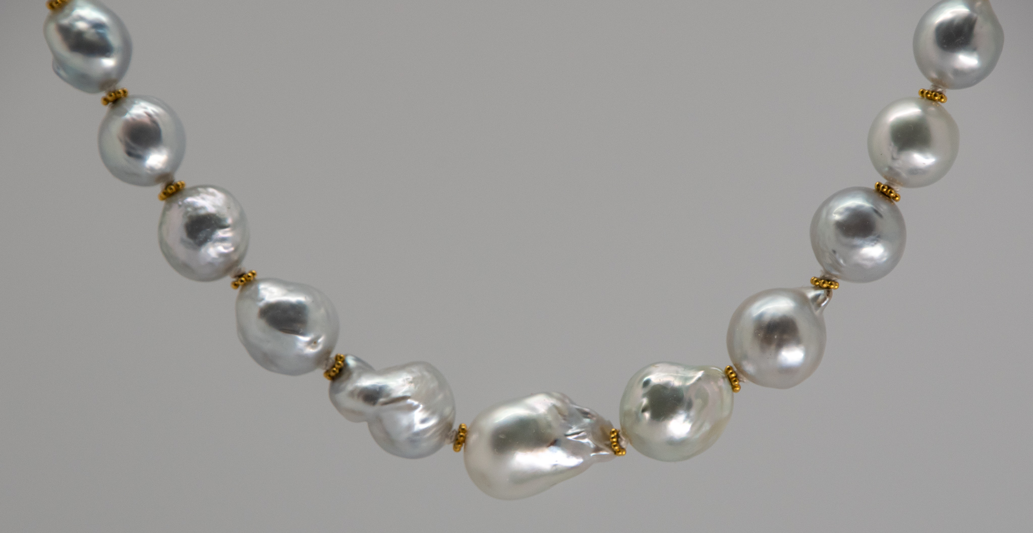 Closeup of central pearls on south sea pearls necklace