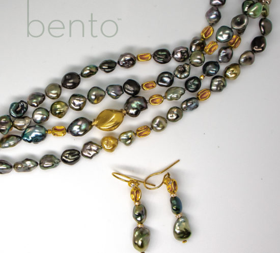 Close up photo of Tahitian Keshi pearl necklace & earrings