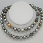Closeup photo of 12.5mm Tahitian pearl necklace wrapped twice for a double strand look.